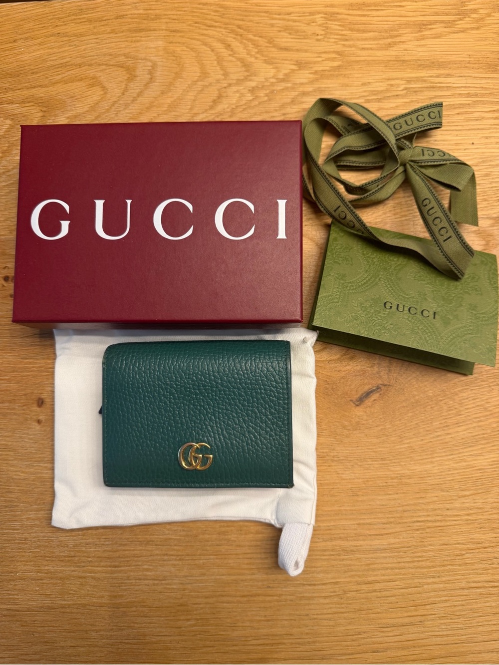 Gucci Men's Teal Pebbled Leather Bifold Wallet with Gold Double G